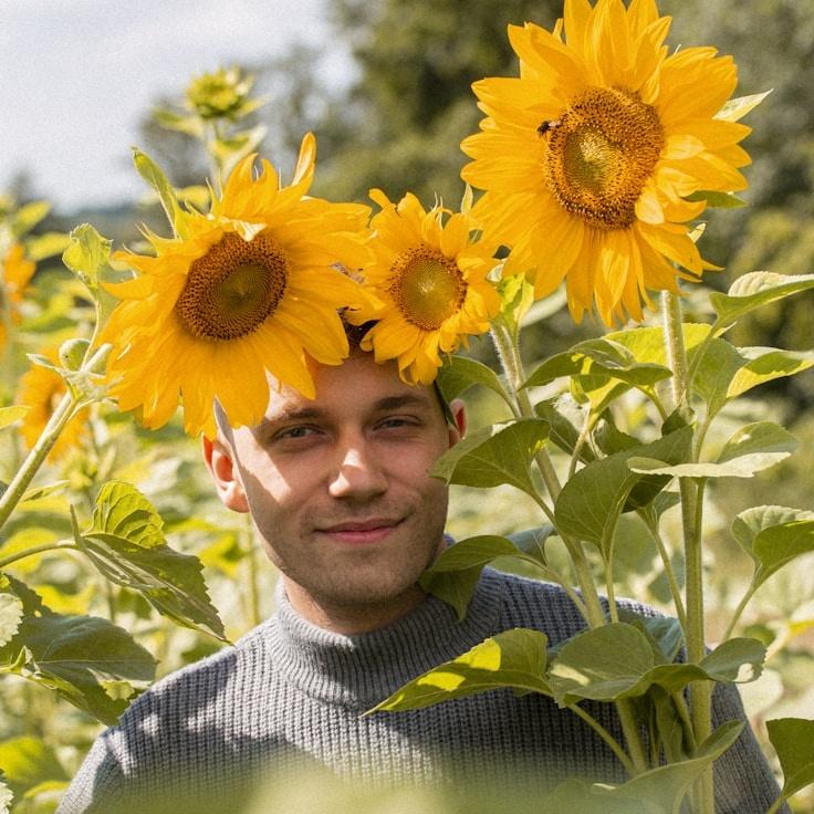 Avery Collins, Lead Design Curator at Harbor Cluster Leaf, reviewing corporate floral arrangements